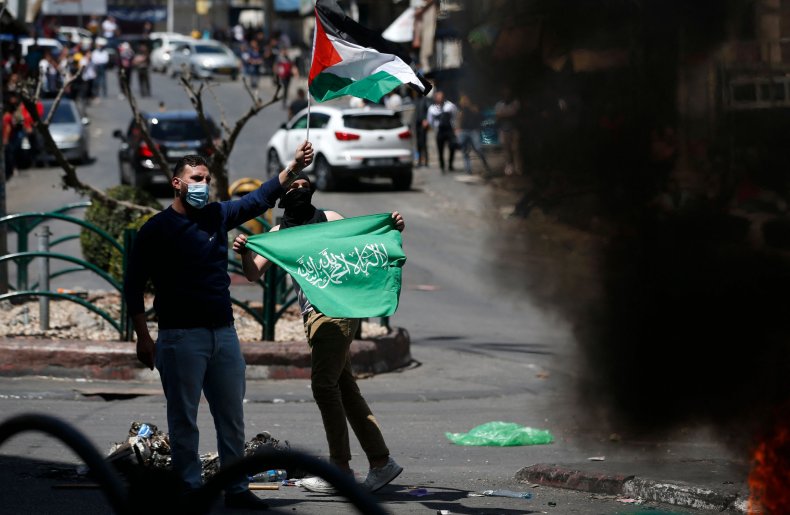 Palestinians Demonstrators Wave Flag