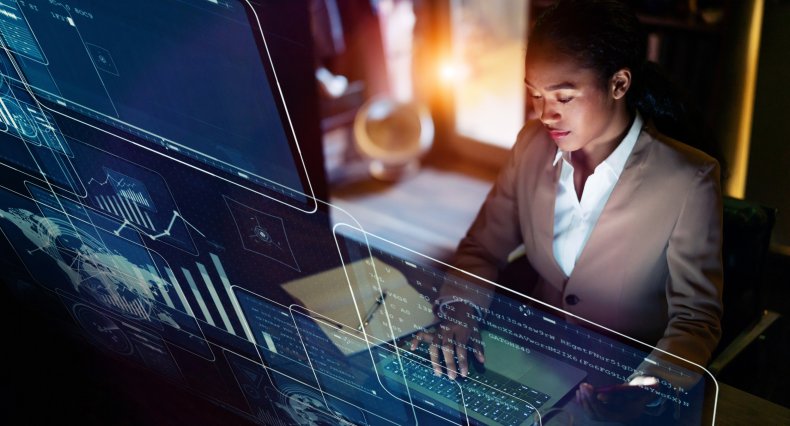 Woman at computer with graphics