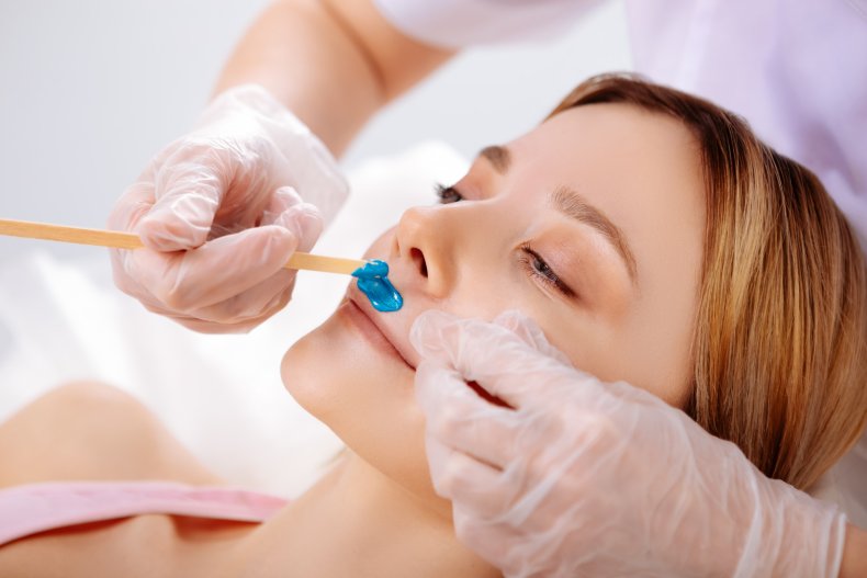 Stock image of a woman getting waxed