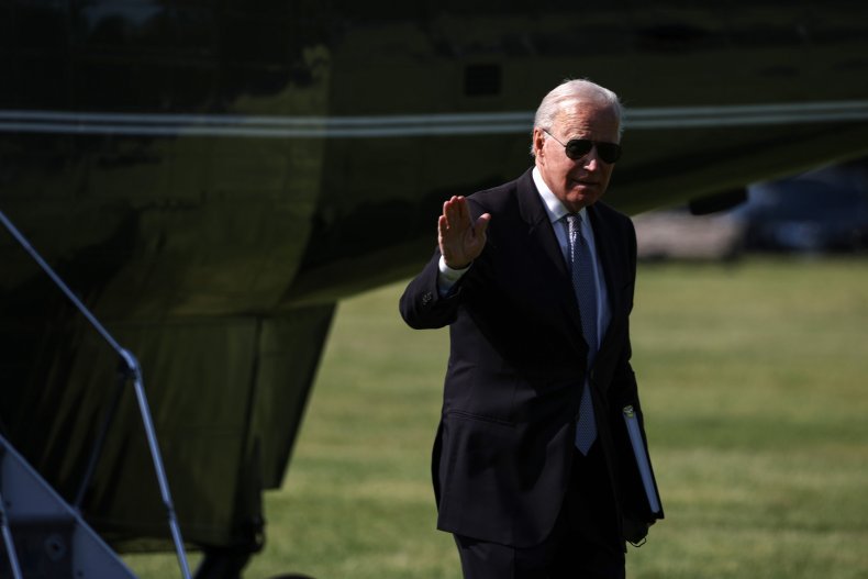 Biden waves after stepping off Marine One