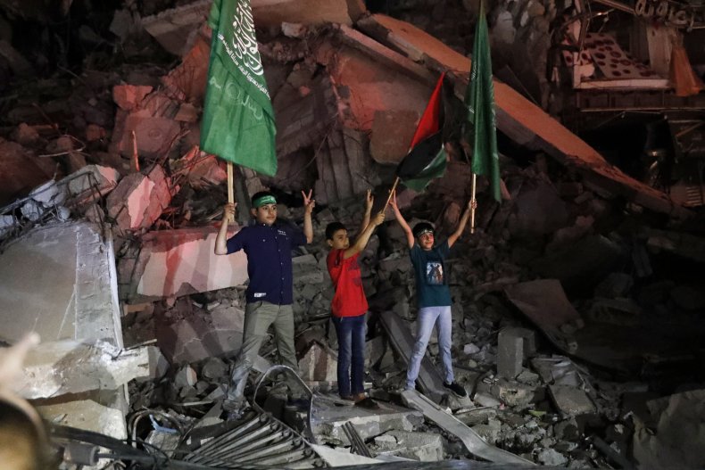 palestinian children wave flags