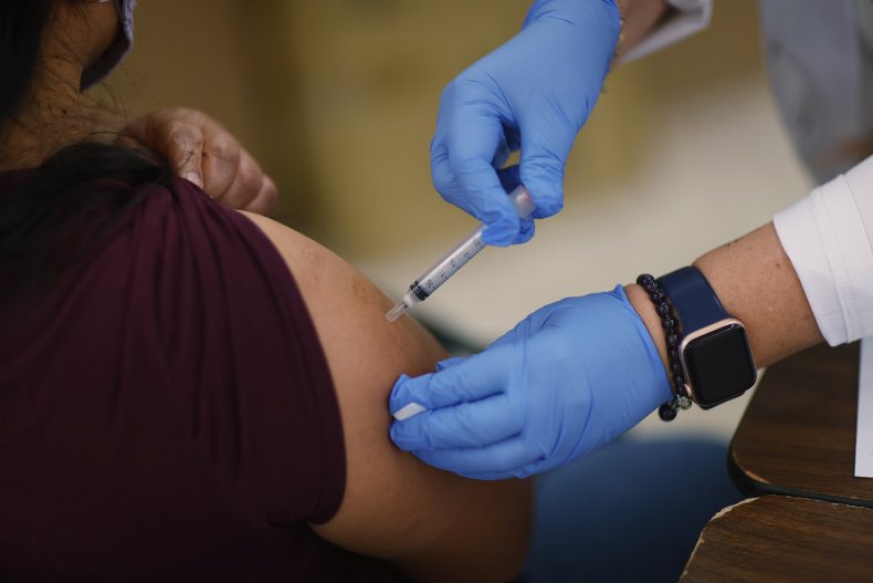 The Moderna COVID-19 vaccine being administered