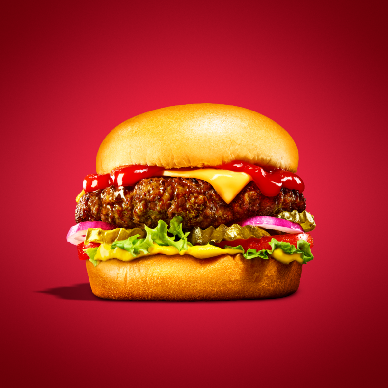 A photo of a HEINZ burger