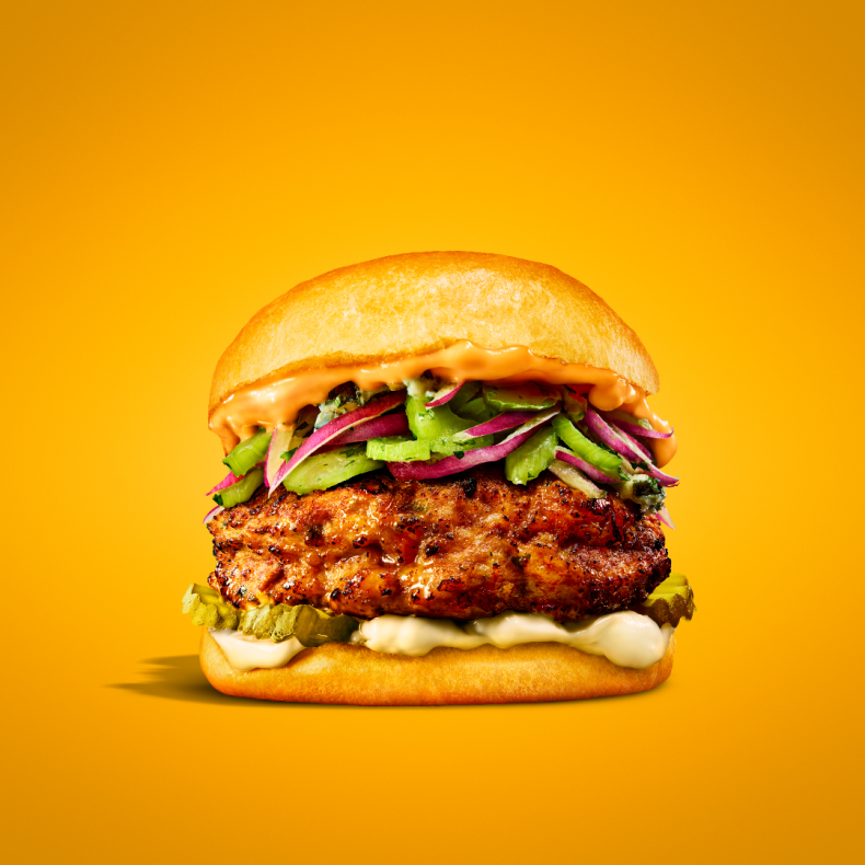 A photo of a HEINZ burger