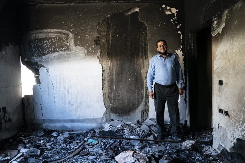 Man Standing in Gaza City Carnage