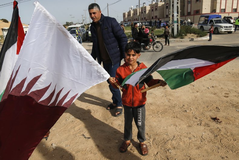 Palestinian, boy, holding, Qatar, Palestinian, flags, Gaza