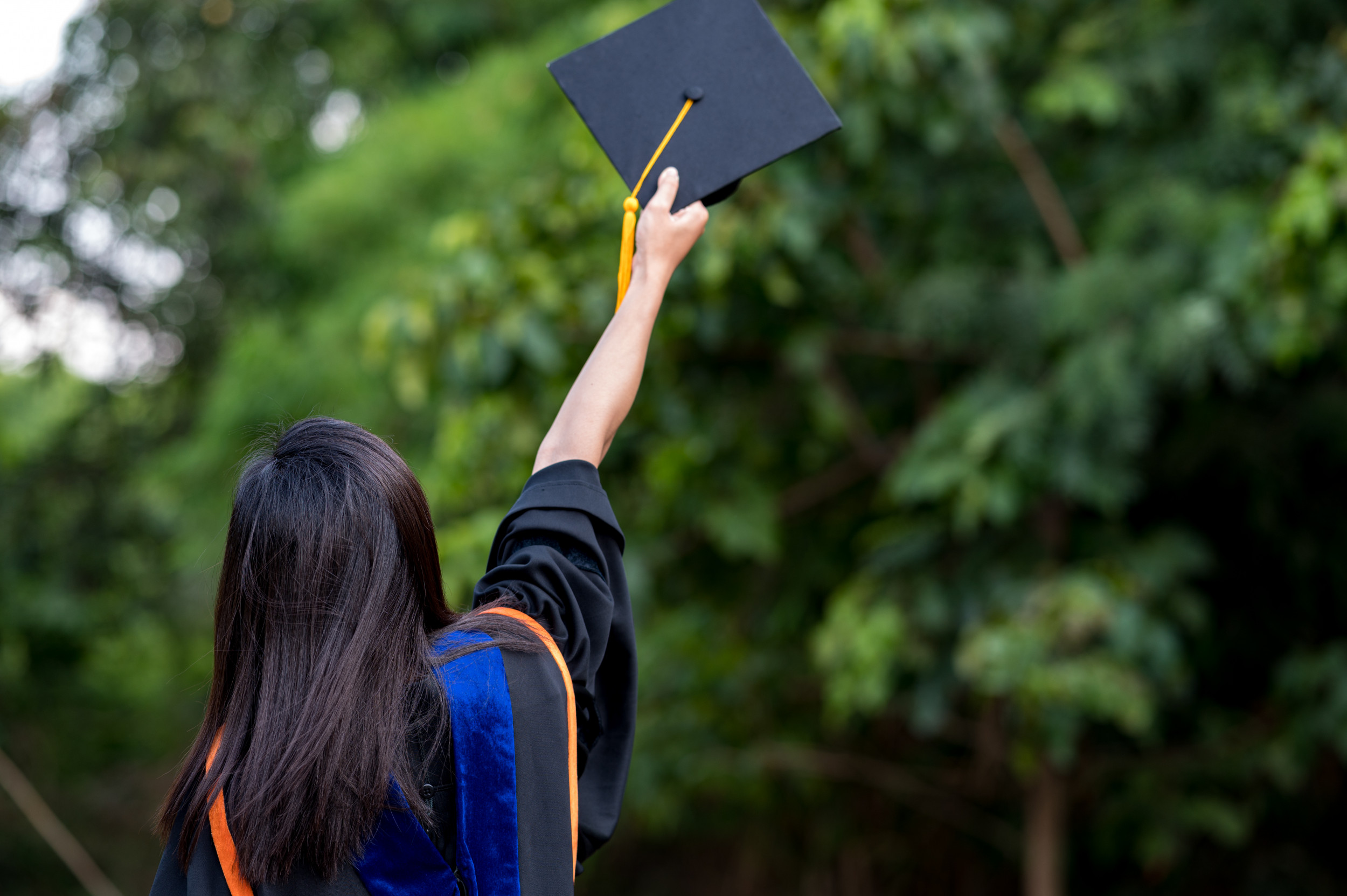 Woman's Graduation Walk Ruined by Screaming Match in the Background