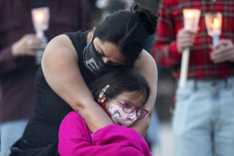 Woman and daughter at memorial