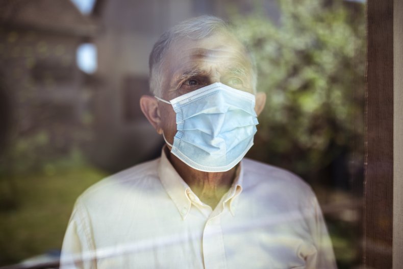 old man wearing a mask