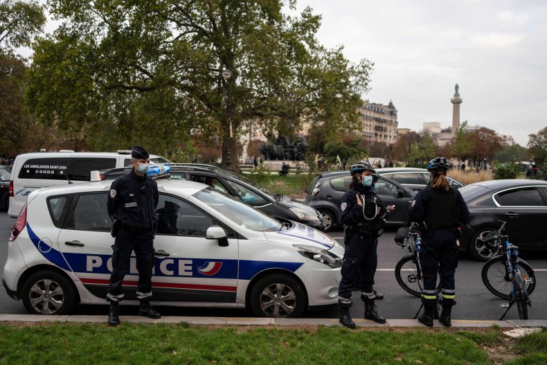 Paris police officers stand during protest