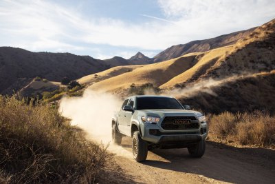 2022 Toyota Tacoma Trail Edition driving front 2022 Toyota Tacoma Trail Edition driving front