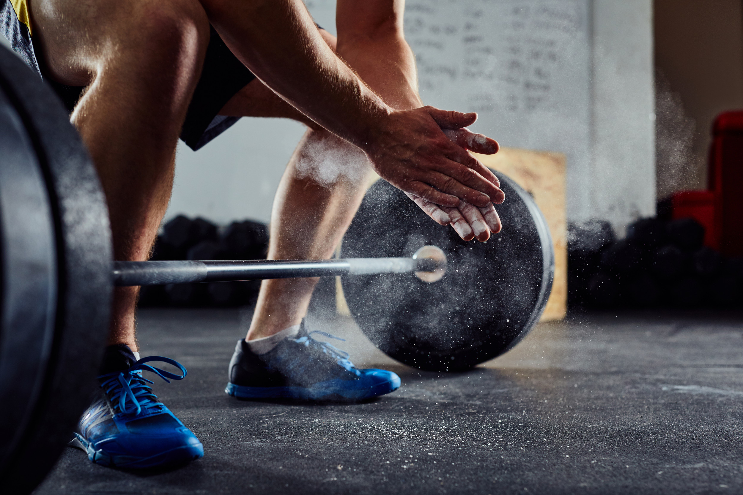 https://d.newsweek.com/en/full/1813095/closeup-weightlifter-clapping-hands-before-barbell.jpg