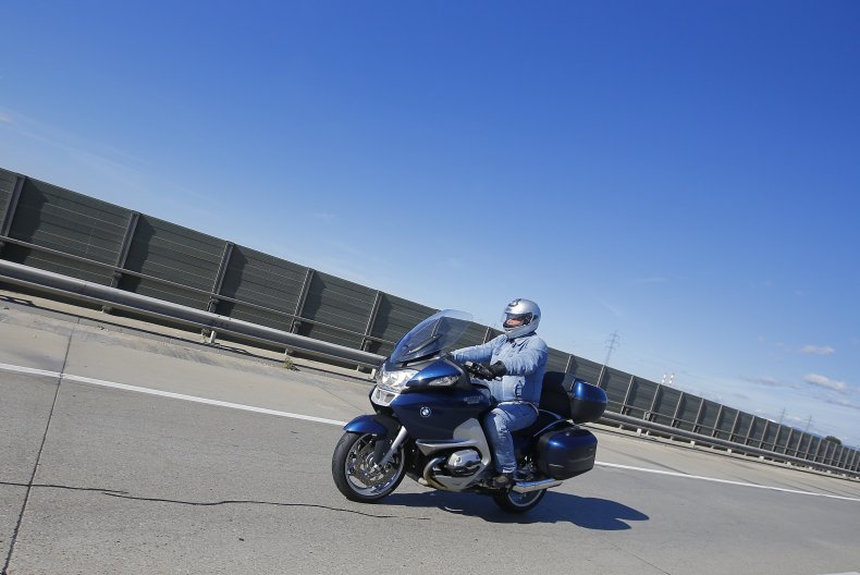 A man rides a motorcycle in Austria.
