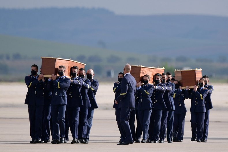 Burkina-Spain ConflictSpanish airforce personnel carry the coffins