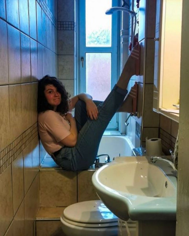 Amber Milne in her tiny bathroom