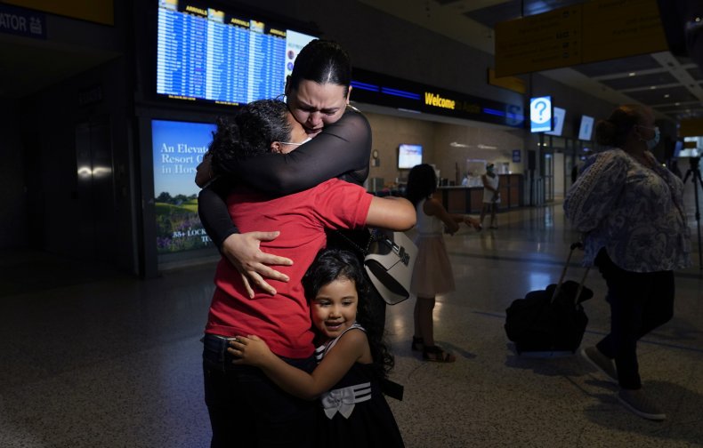Mother and Daughter Embracing After Separation