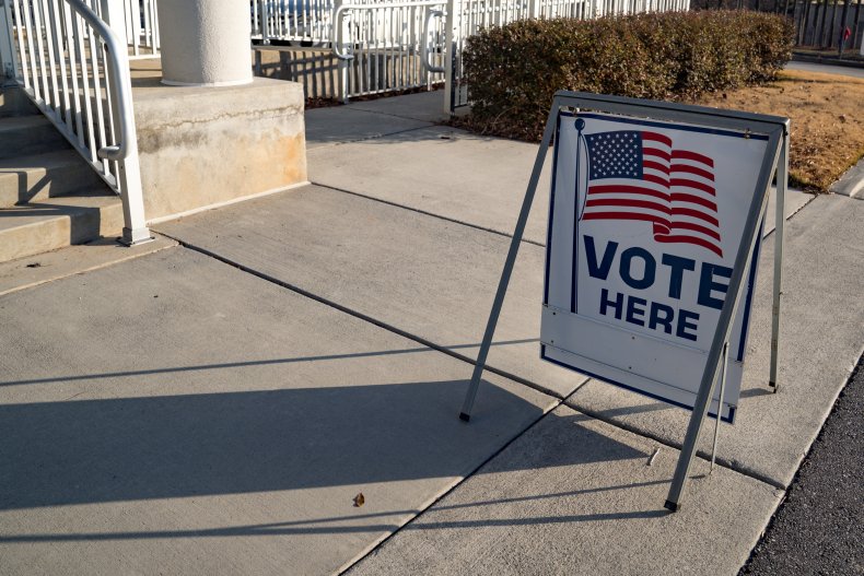 A sign directing voters