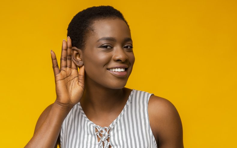 Stock image of a woman listening