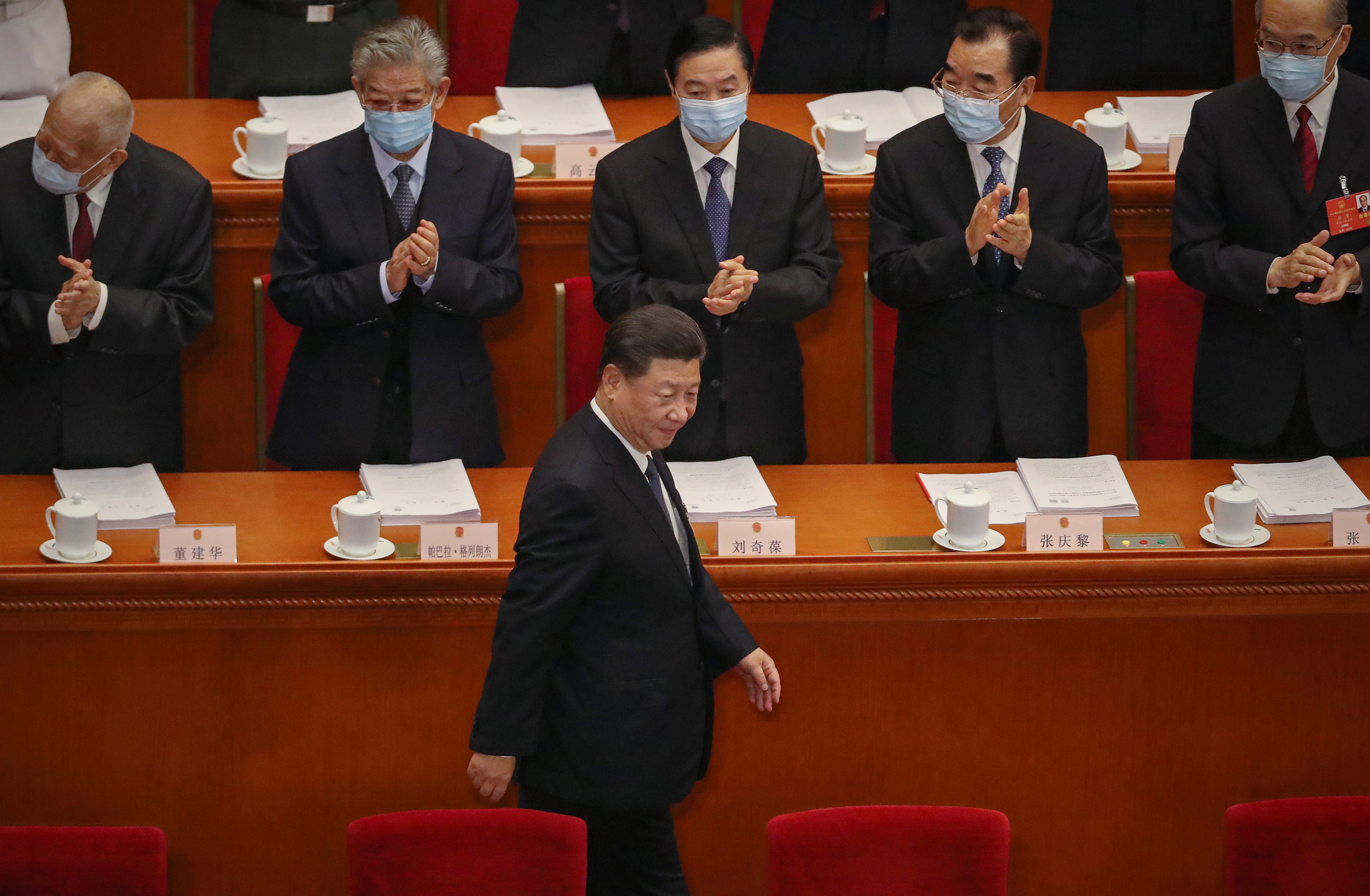 chinese lawmakers applaud xi jinping