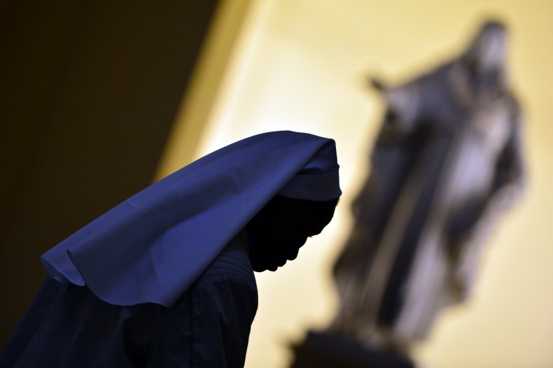 Nun in church