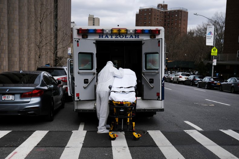 Ambulance driver cleans gurney