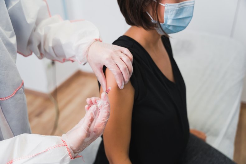 Woman being vaccinated