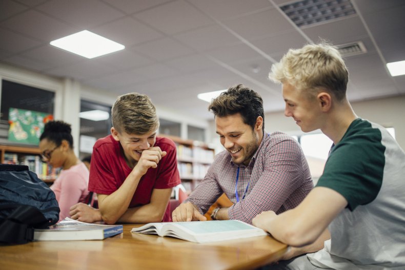 Students get help from teacher