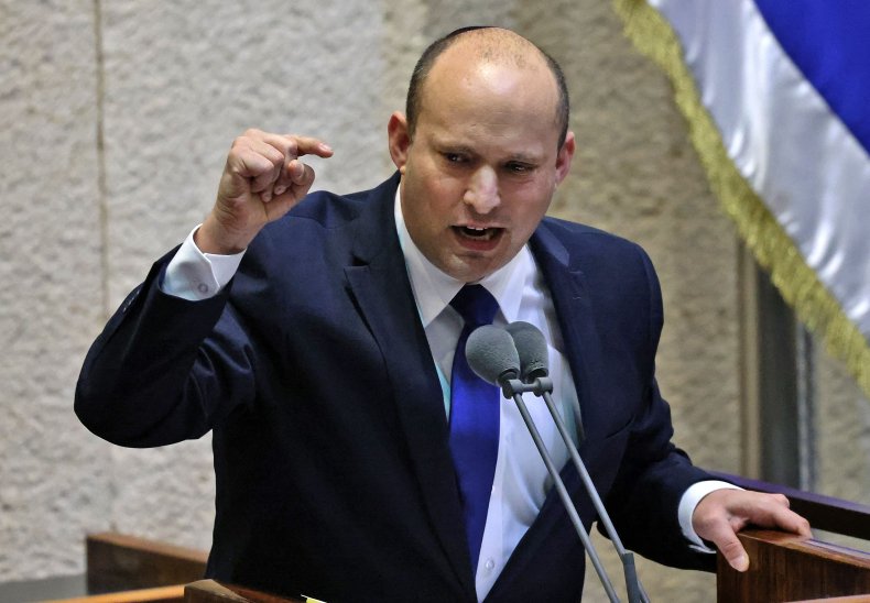 Naftali Bennett addresses lawmakers at the Knesset