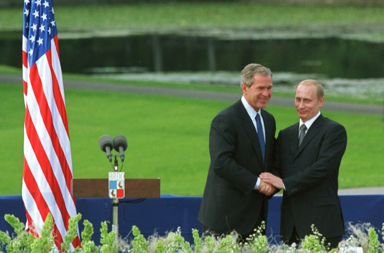 George W. Bush Shakes Hands with Putin