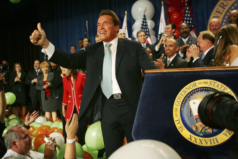 Arnold Schwarzenegger celebrates victory