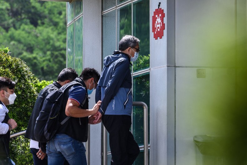 Hong Kong Police Arrest Apple Daily Editors
