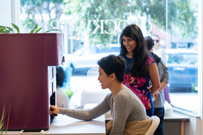 AI manicure machine and woman