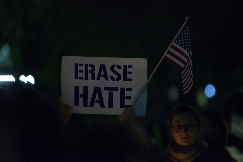 'Erase Hate' Sign Havdalah Vigil
