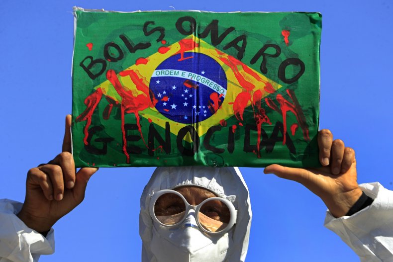 Brazil hurtles toward 500K official COVID deaths as debate rages over real death toll numbers 2 Protestor Brazil