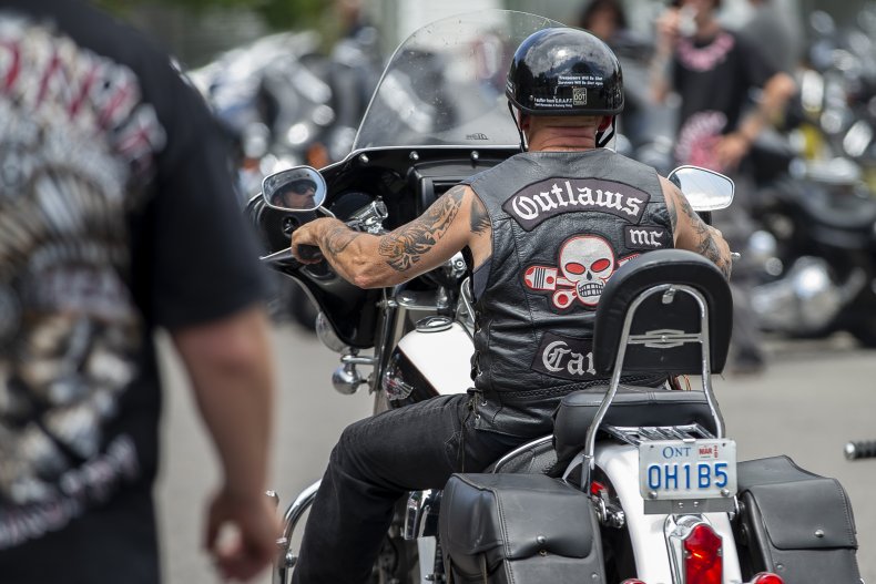 Motorcycle gang members attend a gathering.