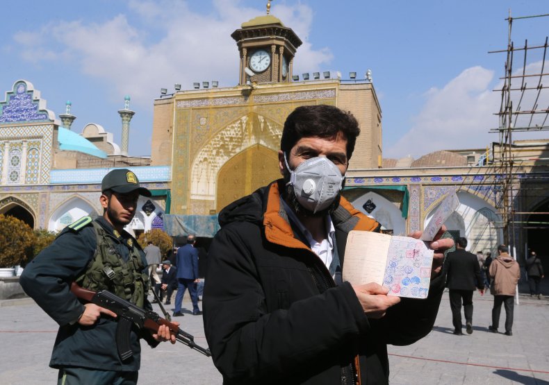 Iranian Voter Shows ID