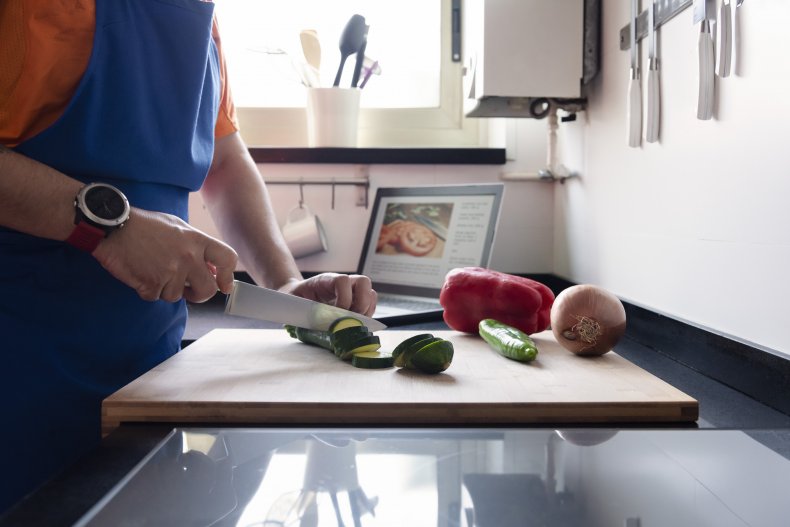 Man chopping veggies