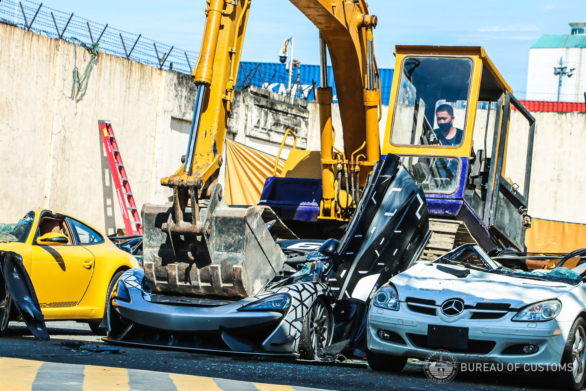 21 Smuggled Vehicles Destroyed in a Public Display in the Philippines