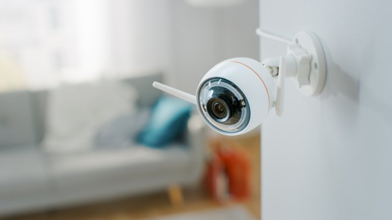 security camera women being watched in bed