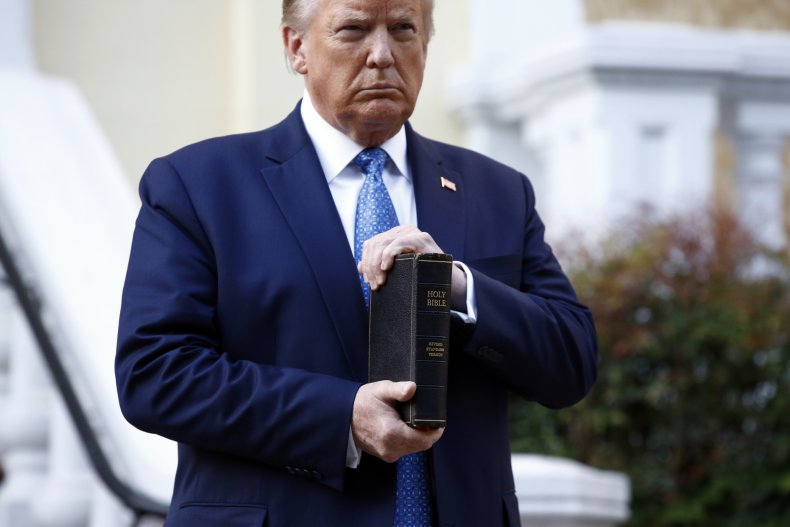 Then-President Donald Trump Holding a Bible