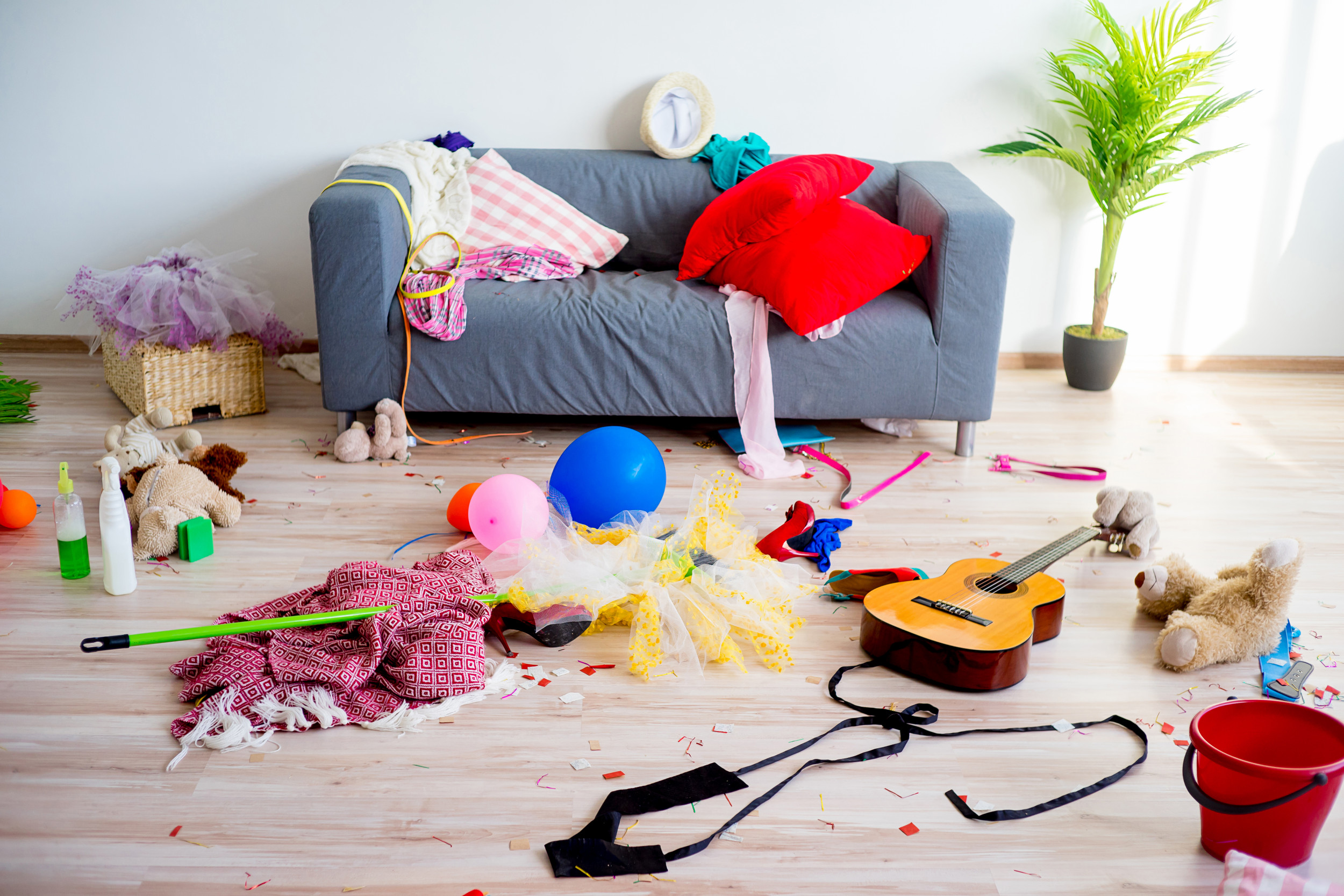 messy living room with toys