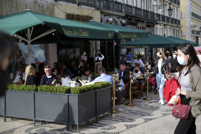 Woman Wears Mask in Lisbon, Portugal