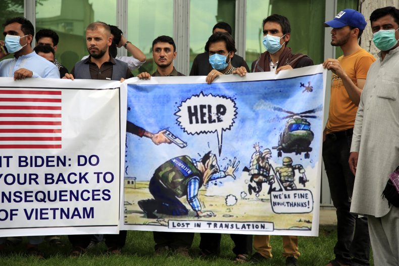 Afghan Interpreters Hold Banner