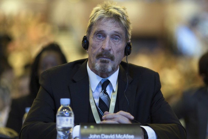 John McAfee Listens During Internet Security Conference
