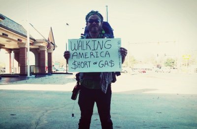 Jake Sansing with sign during walk Jake Sansing with sign during walk