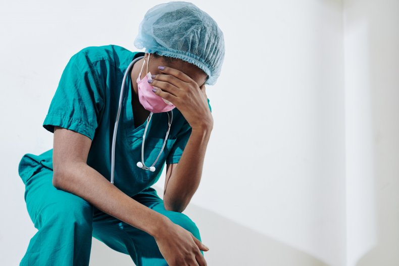 Nurse crying in hospital