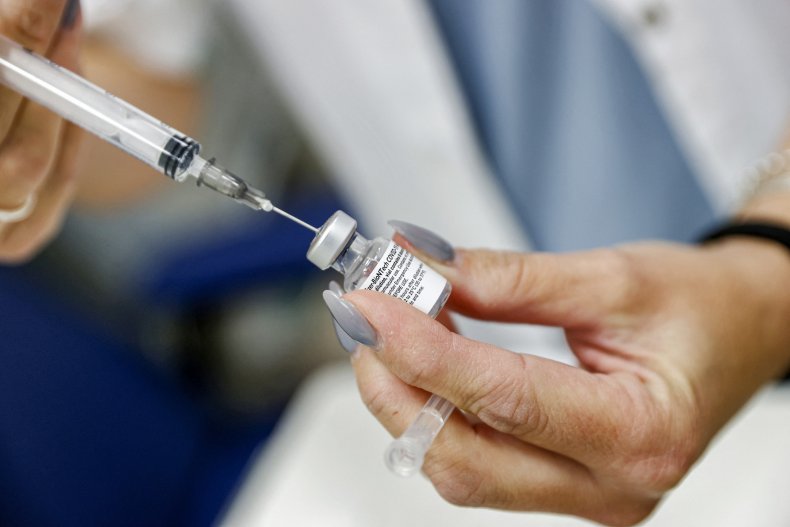 Medic prepares COVID-19 vaccine