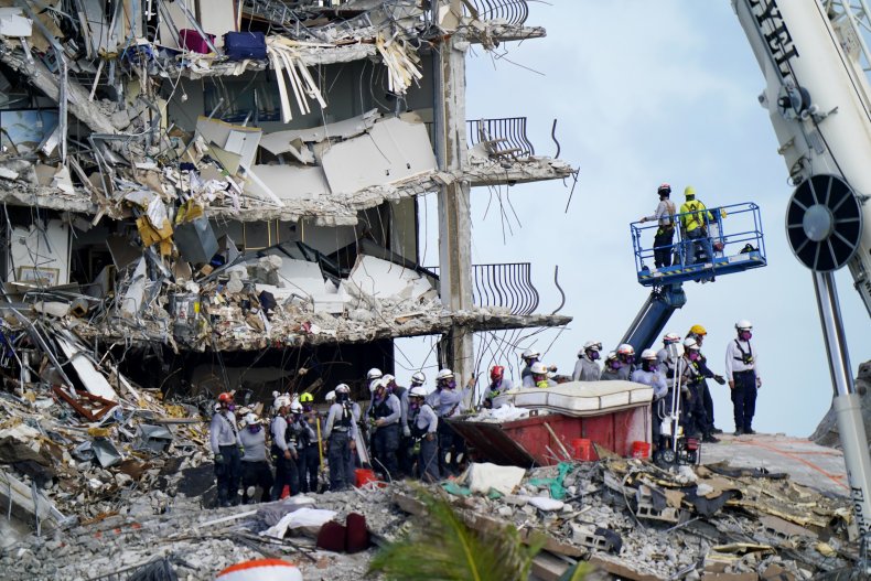 Workers Searching Through Rubble of Surfside Condo