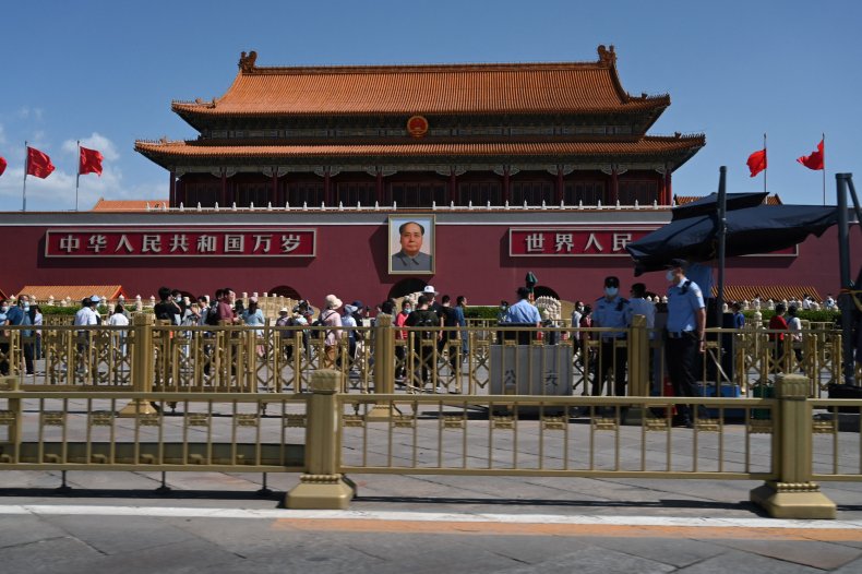 Police officers keep watch in Tiananmen Square
