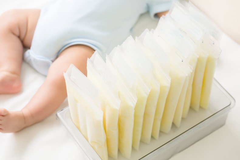 Stock image of a baby and breastmilk